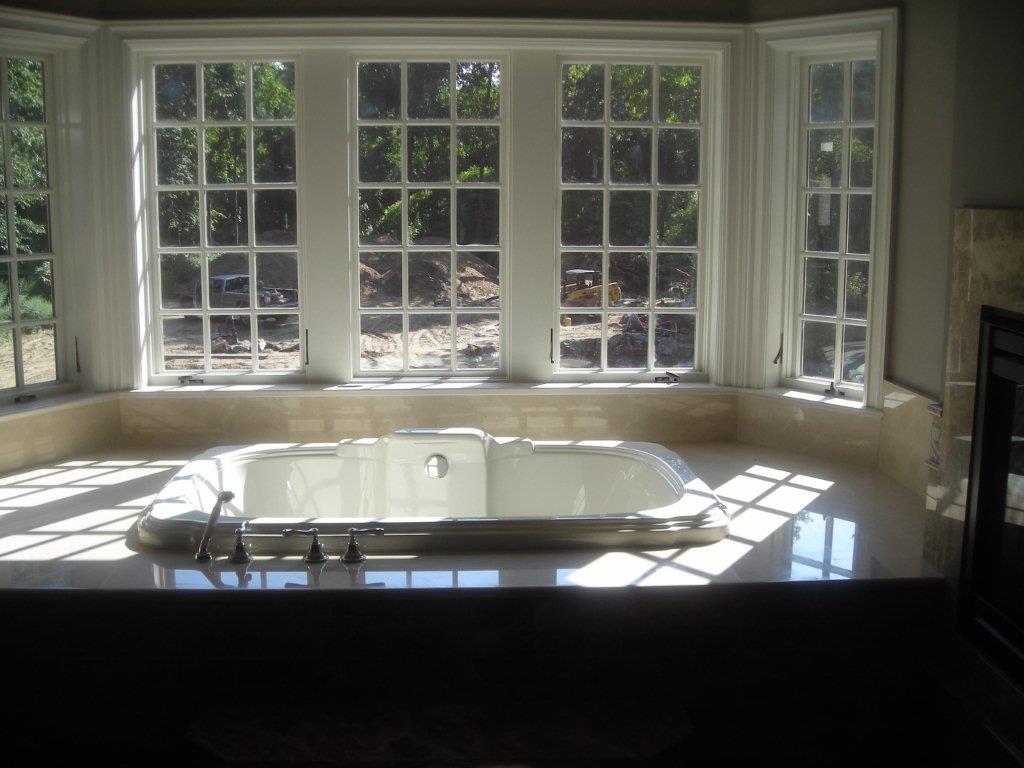 A bathtub sitting in the middle of a room.